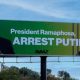 Arrest Putin billboard