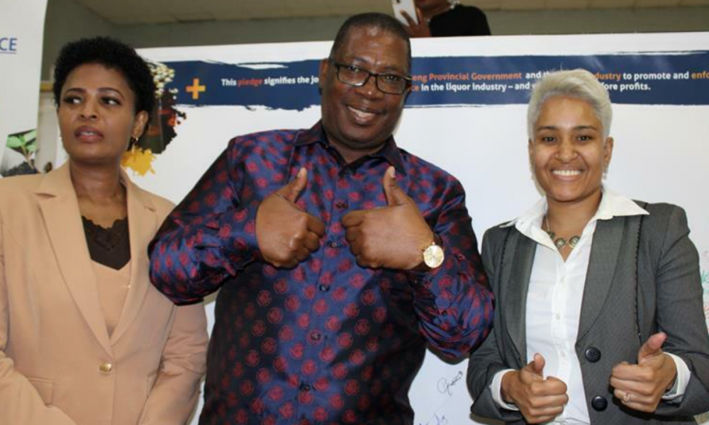 Thobile Magerman with Premier Panyaza Lesufi and Tasneem Motara, the MEC for Economic Development after signing the pledge