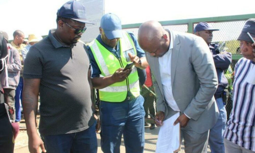 Center Manager Kulani Nkuna signing the memorandum