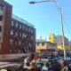 EMS personnel and police are seen on site in a building in Johannesburg that caught fire in the early hours of the morning in this image captured on 31 August 2023.