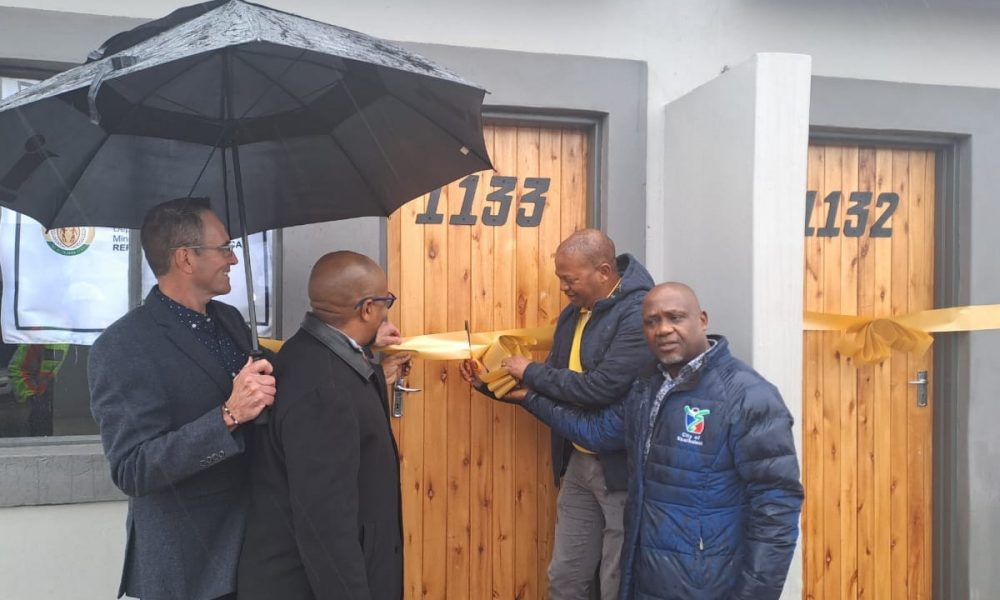 afrisam hands over low-cost houses